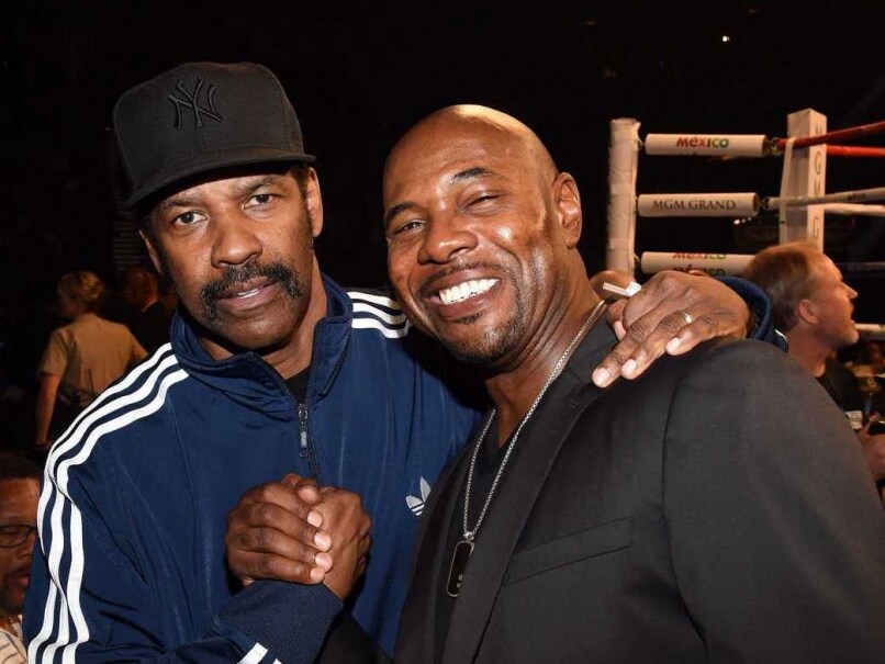Denzel Washington (L) and director Antoine Fuqua