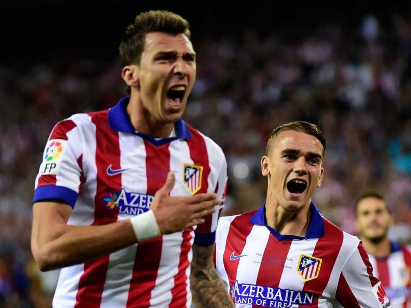 La Liga Champions Atletico Madrid Struggle Past Eibar for First Win