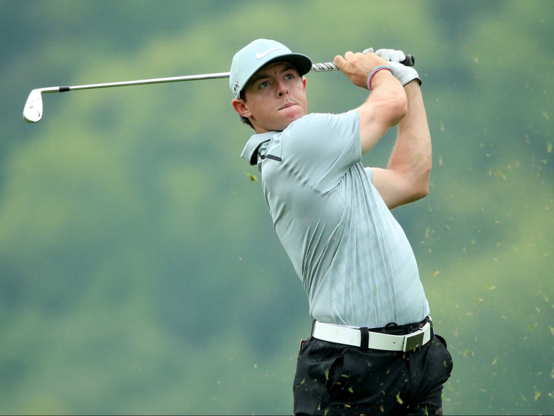 Rory McIlroy Leads But Rivals Make Charge at Rainy PGA Championship, Tiger Woods Misses Cut