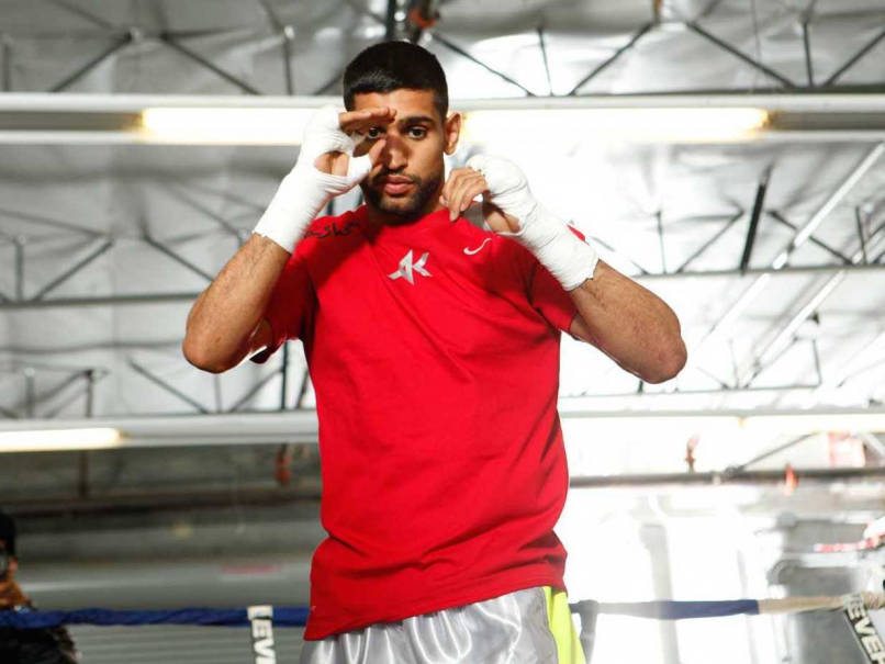 Boxer Amir Khan of Britain Arrested in Assaults Probe