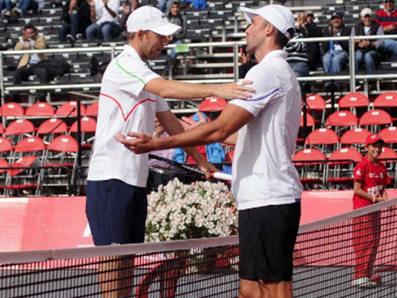 When Tennis' Big Guys Become 'Too Big' for Just a Handshake