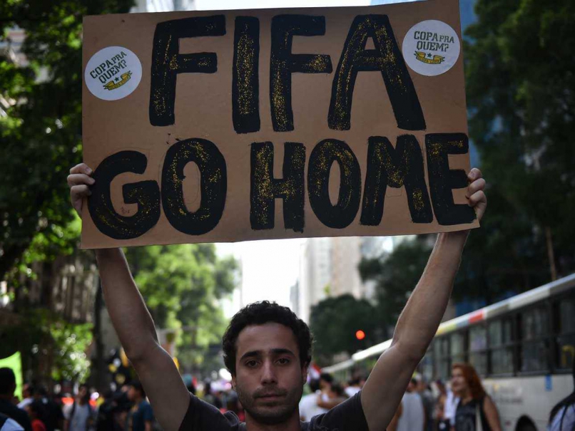 FIFA World Cup: Rio Officer Shoots Live Round During Protests