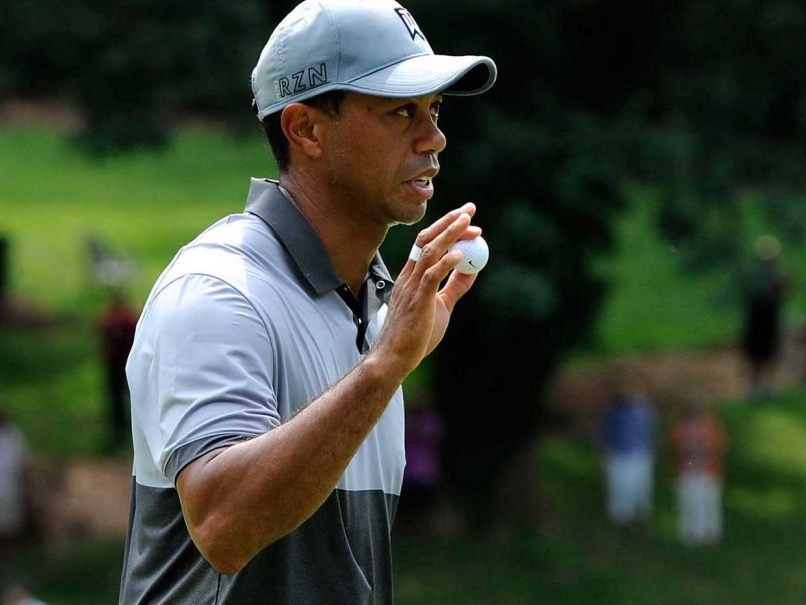 Tiger Woods Stalks Jason Gore in Search of Wyndham Win