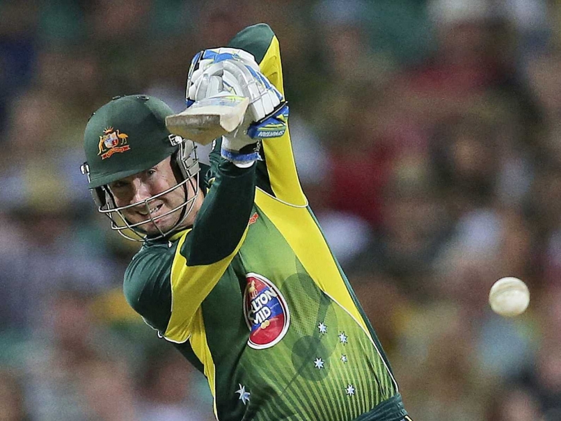 Michael Clarke Swings Baseball Bat in Practice