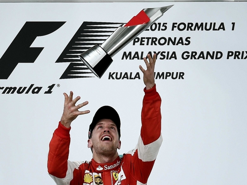 Malaysian GP: Sebastian Vettel Turns Air blue, Paints Town Red