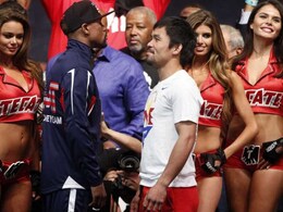Floyd Mayweather Jr, Manny Pacquiao Saluted by Lively Crowd at Weigh in Ritual Floyd Mayweather Jr, Manny Pacquiao Saluted by Lively Crowd at Weigh in Ritual