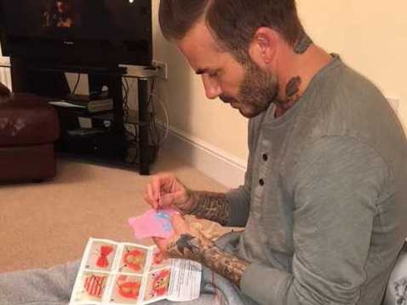 David Beckham Stitches Dress For Youngest Daughter's Doll
