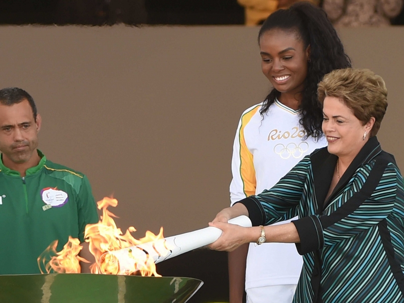 Brazil President Dilma Rousseff Lights Olympic Flame as Protesters Hit Streets