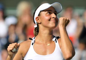 Paszek survives marathon to shock Schiavone