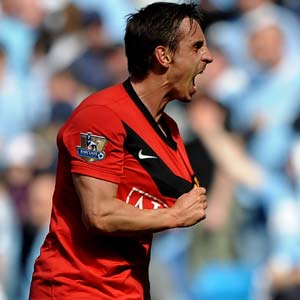 Hodgson hires Neville as assistant England coach