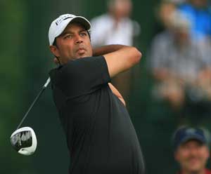 Atwal tied 18th with Tiger Woods