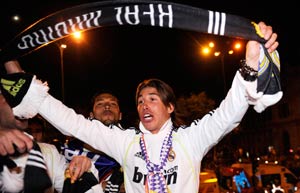 Spanish football Cup slips, falls under bus