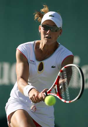 Stosur through, but dizzy exit for Chakvetadze