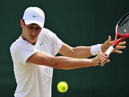 Bernard Tomic thrashed but Ebden wins for Australia Bernard Tomic thrashed but Ebden wins for Australia