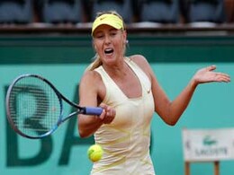 Sharapova withdraws from Wimbledon warmup event Sharapova withdraws from Wimbledon warmup event