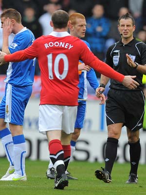 Former players slam Rooney over 'elbow'