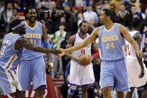 Miller leads Nuggets over 76ers