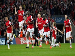Arsenal F.C. edge Wigan Athletic to reach FA Cup final after nine years Arsenal F.C. edge Wigan Athletic to reach FA Cup final after nine years