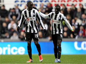 Demba Ba double sinks 10-man Wigan