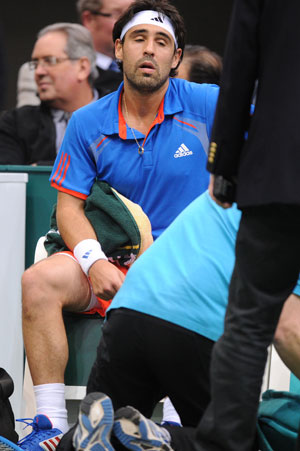 Berdych through at ABN Amro as Baghdatis retires