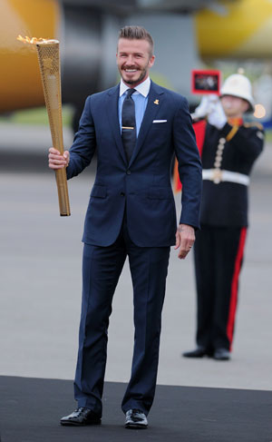 Olympic flame arrives in Britain for 2012 torch relay