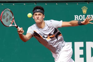 Australia's Bernard Tomic goes down battling in Barcelona