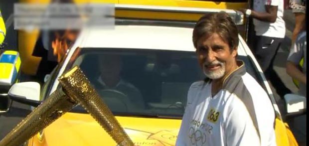 Amitabh Bachchan carries Olympics torch in London