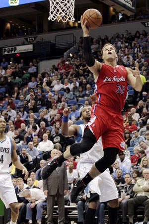 Griffin, Clippers overwhelm Love-less Wolves