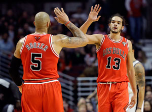 Bulls beat Nets to close on Central lead