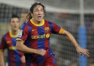 Puyol back in Barcelona for match against Santander