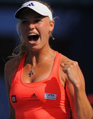 Wozniacki beats 40-year-old Date-Krumm at French Open