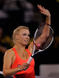 French Open: Caroline Wozniacki eases past Laura Robson