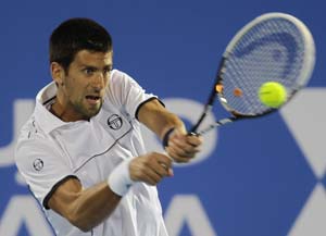 Novak Djokovic beats John Isner to reach Paris Masters quarter-finals