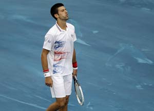 Novak Djokovic crashes out, vows no return to blue clay