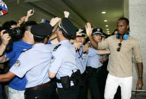 China bows down to 'Devil Beast' Didier Drogba