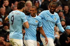 EPL: Manchester City overwhelm Arsenal to stake title claim