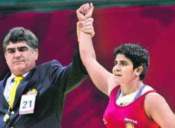 After winning case against federation, wrestler's Olympic dream hit by visa roadblock