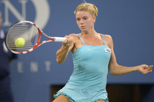 US Open: Tiny blonde bombshell Camila Giorgi goes wild
