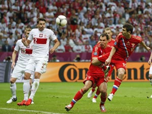 Euro 2012: Poland, Russia draw 1-1 as fans clash in Warsaw