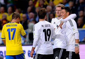 Andre Schurrle nets hat-trick as Germany floor Sweden in eight-goal thriller