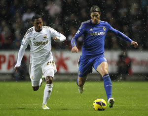 Chelsea loses top spot after 1-1 draw at Swansea
