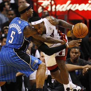 James scores 19 as Heat top Magic in preseason