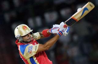 Bangalore win thriller for semis berth