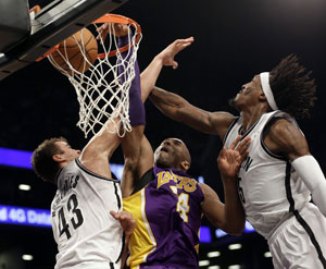 Short-handed Los Angeles Lakers beat Brooklyn Nets 92-83
