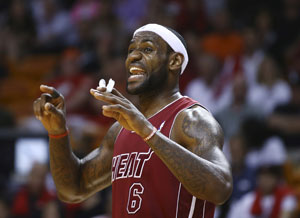 NBA:  LeBron James scores 25 points as Miami Heat hold off Cleveland Cavaliers 114-107