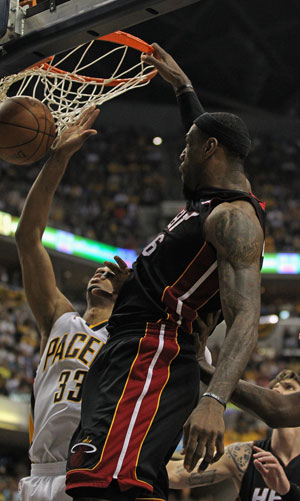 James and Wade power Heat past Pacers