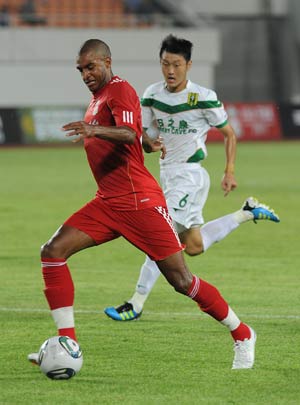 Adam debut as Liverpool win in China