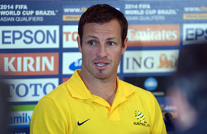 'Nobody's in Brazil yet,' warns Australia football captain Lucas Neill