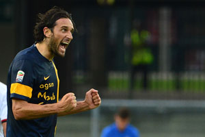 Luca Toni's Verona double sinks sorry AC Milan
