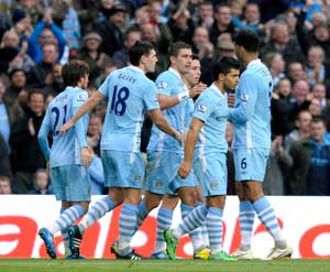 Man City maintain lead as brave Wolves downed